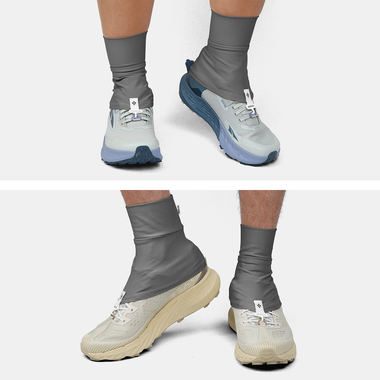 Two pairs of feet wearing trado trail gaiters on a white background charcoal