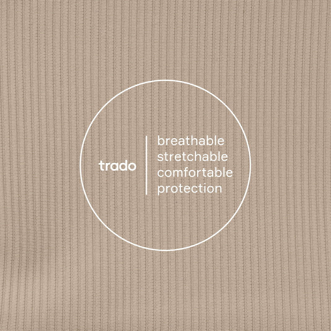 Text 'trado' and descriptors on a tan textured background