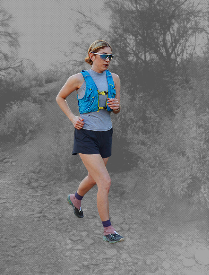 Person running outdoors with a blurred background