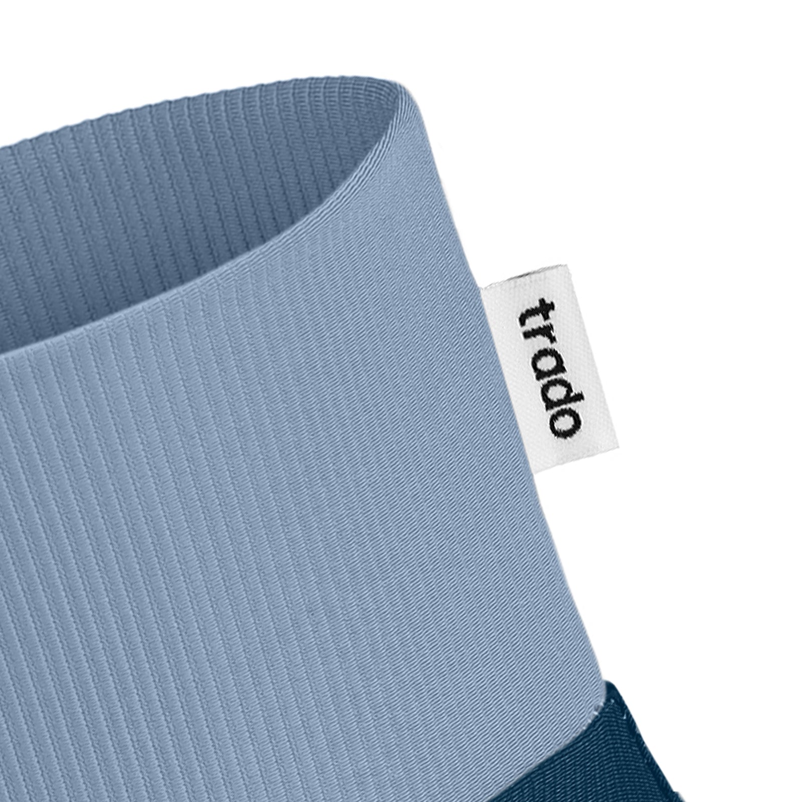 trado label on the trado trail gaiter baby blue midnight blue