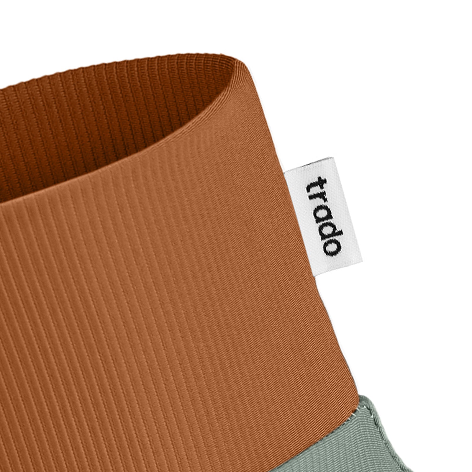 trado label on the trado trail gaiter copper dusty green