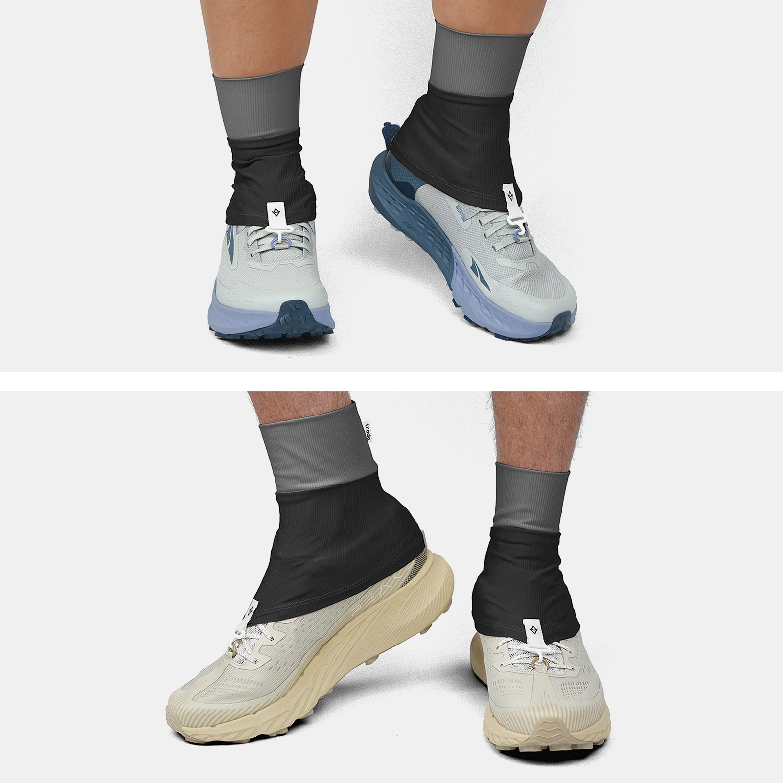 Two pairs of feet wearing trado trail gaiters on a white background black charcoal